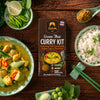 Siam Green Thai Curry Kit with curry dish, rice, and ingredients on a wooden table