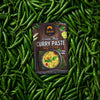 Siam Green Thai Curry Paste package surrounded by green chilies
