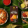 Siam Pad Thai noodles kit packaging with ingredients on a green leaf background